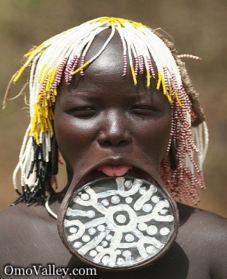 Bumi or Bume also known as Nyangatom A woman of the Mursi tribe
